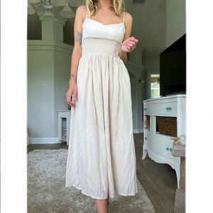 Tan dress, brand Lulus. Never worn still with tags. Size small.